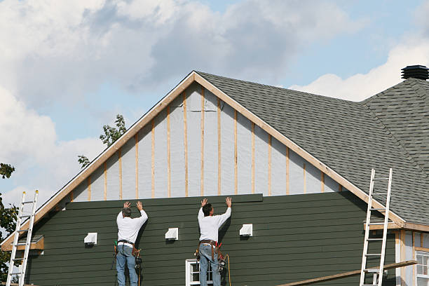 Professional Siding Contractor technician working in Springfield, SC